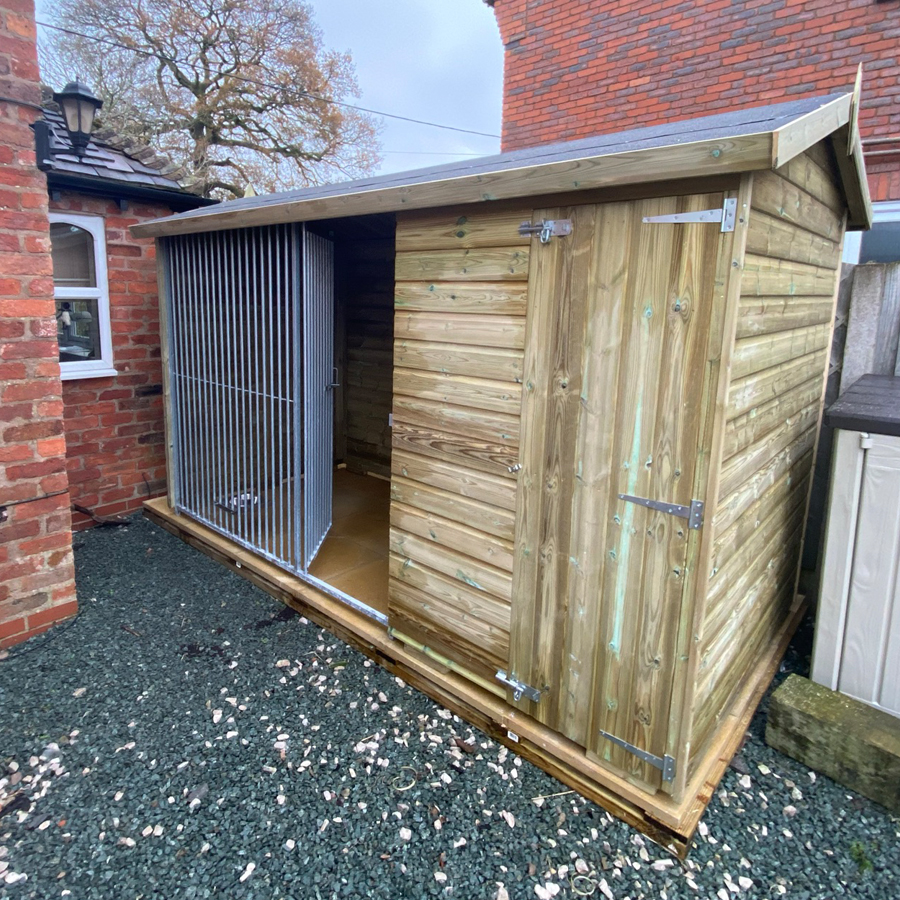 Timber outdoor dog kennel installation in London